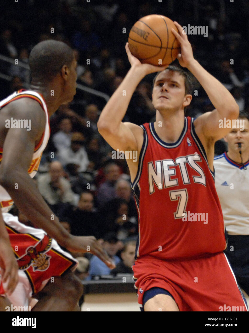 New Jersey Nets' Bostjan Nachbar, right, fouls New York Knicks