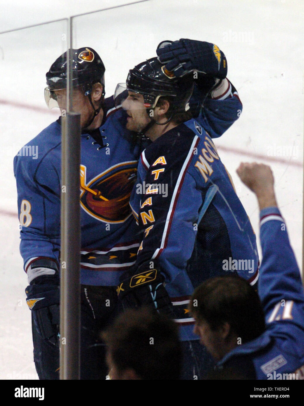 Atlanta Thrashers Marian Hossa (18), of Slovakia, congratulates teammate Steve McCarthy (5) for his goal against the visiting Tampa Bay Lightning in the first period at Philips Arena in Atlanta, February 22, 2007. (UPI Photo/John Dickerson) Stock Photo
