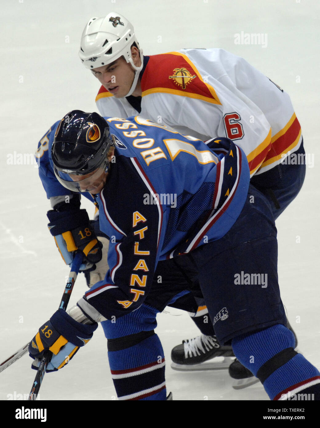 Atlanta Thrashers  Marian Hossa (18), of Slovakia, and Florida Panthers Nathan Horton (16) dig for the puck in the first period at Philips Arena in Atlanta, March 6, 2007. (UPI Photo/John Dickerson) Stock Photo