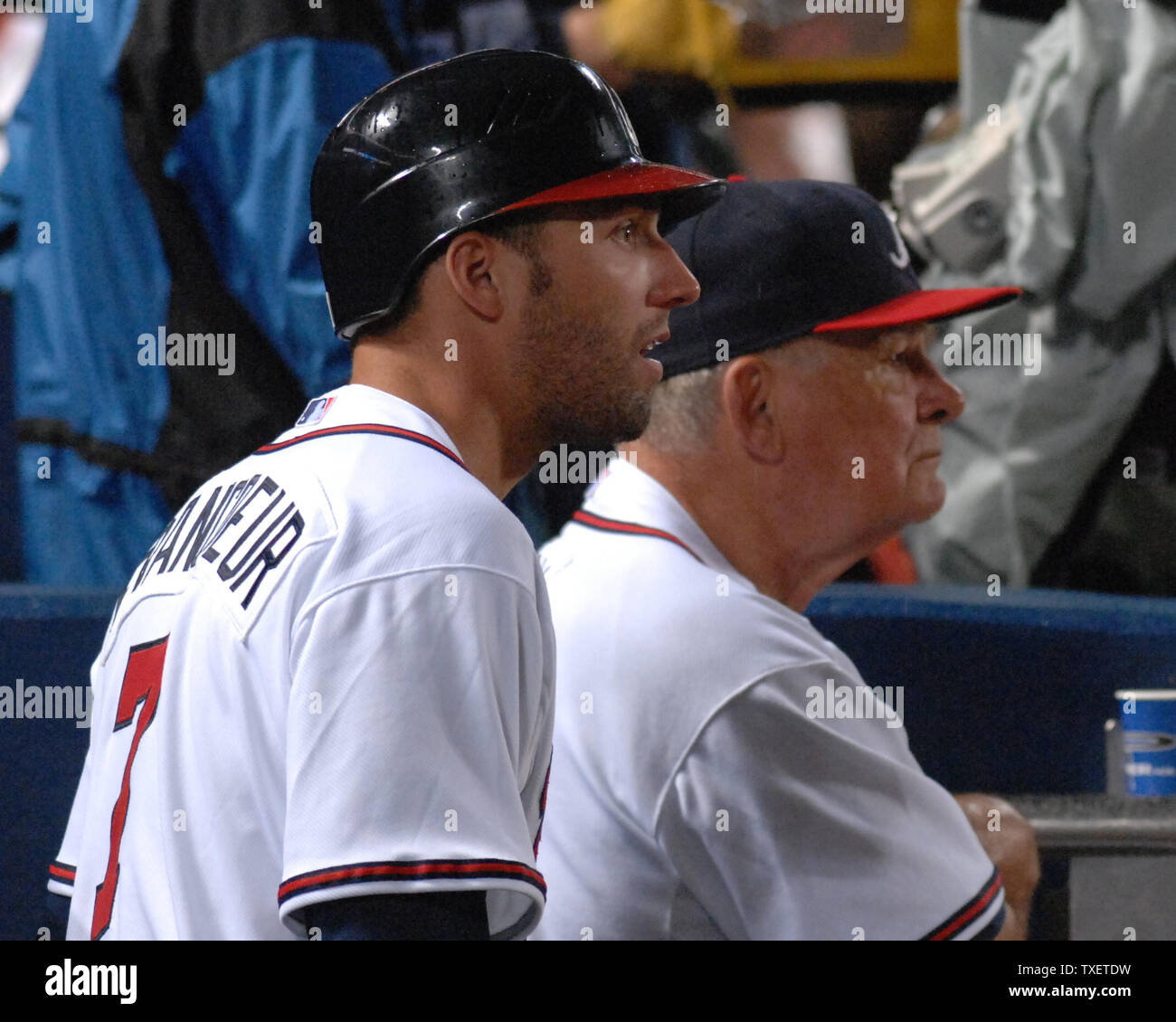 Atlanta Braves Jeff Francoeur (L) and manager Bobby Cox watch play on he field against the Boston Red Sox from the dugout in the sixth inning at Turner Field in Atlanta on June 19, 2007.  Boston beat Atlanta 4-0.   (UPI Photo/John Dickerson) Stock Photo