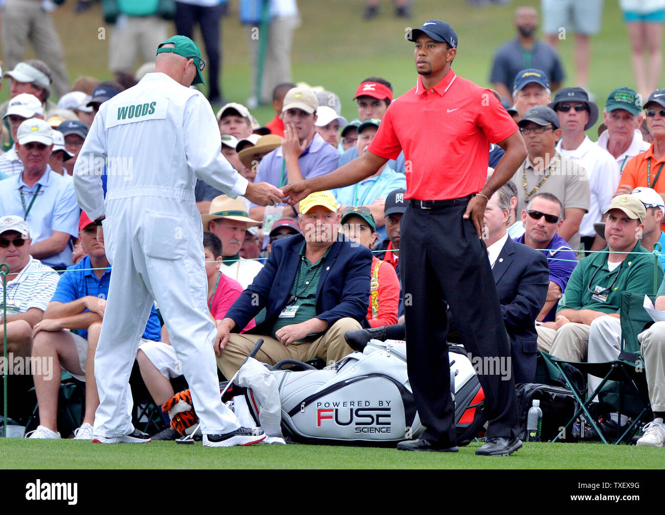 Tiger Woods And Caddie Joe Lacava Stand On A Tee Box On The - 
