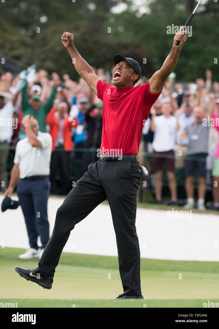 Tiger Woods celebrates after winning the 2019 Masters Tournament at Augusta National Golf Club in Augusta, Georgia, on April 14, 2019. Woods won the tournament 13-under-par. Photo by Kevin Dietsch/UPI Stock Photo