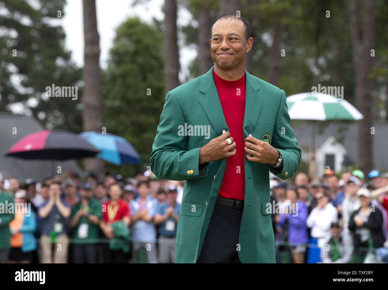 Tiger Woods wears his newly won Green Jacket after the final round at the  2019 Masters Tournament at Augusta National Golf Club in Augusta, Georgia,  on April 14, 2019. Tiger Woods wins