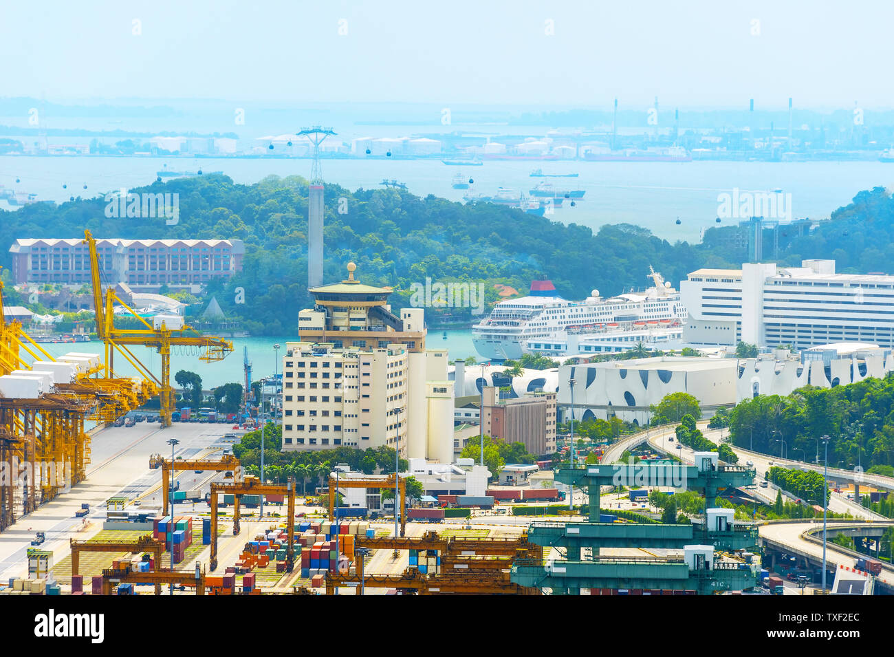 Aerial view of Singapore port, cruise ship and Sentosa island. Singapore Stock Photo