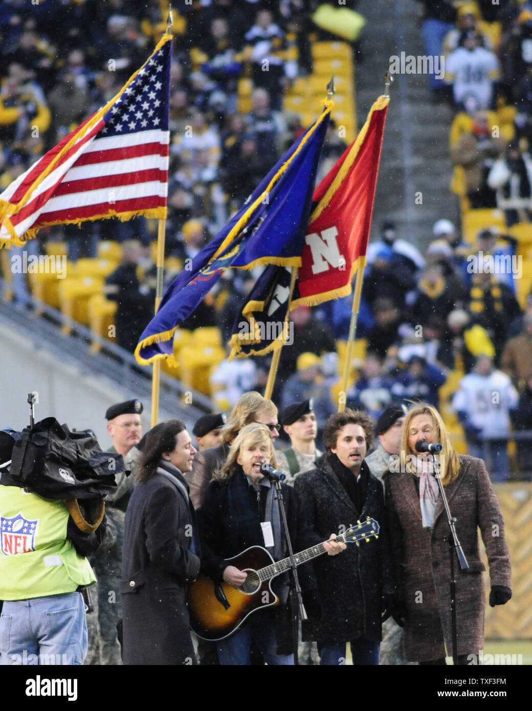 The rock band Styx performs the National Anthem before the AFC divisional playoff game between Pittsburgh Steelers and the San Diego Chargers at Heinz Field on January 11, 2009 in Pittsburgh, Pennsylvania.     (UPI Photo/Archie Carpenter) Stock Photo