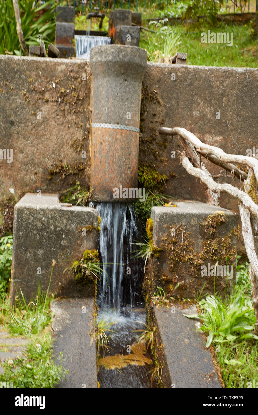 man-made fresh water fall in the trout farm Ribeiro Frio village, Madeira, Portugal Stock Photo