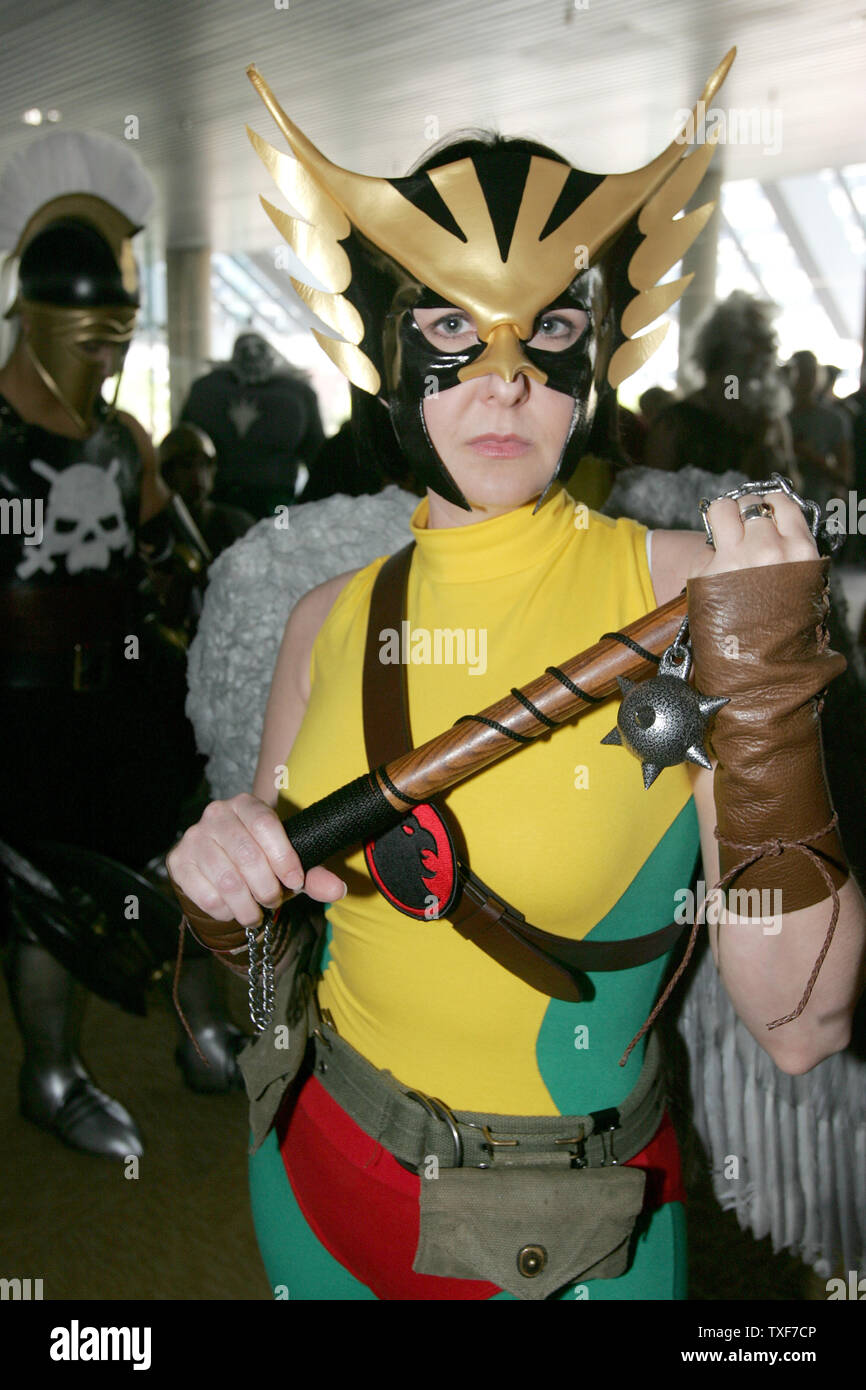 David Santiago (L) as Ares, God of War, and Garrett Gird, as Thor, wait  with others to be judged for the costume contest at the 11th annual Comic  Con in Baltimore on