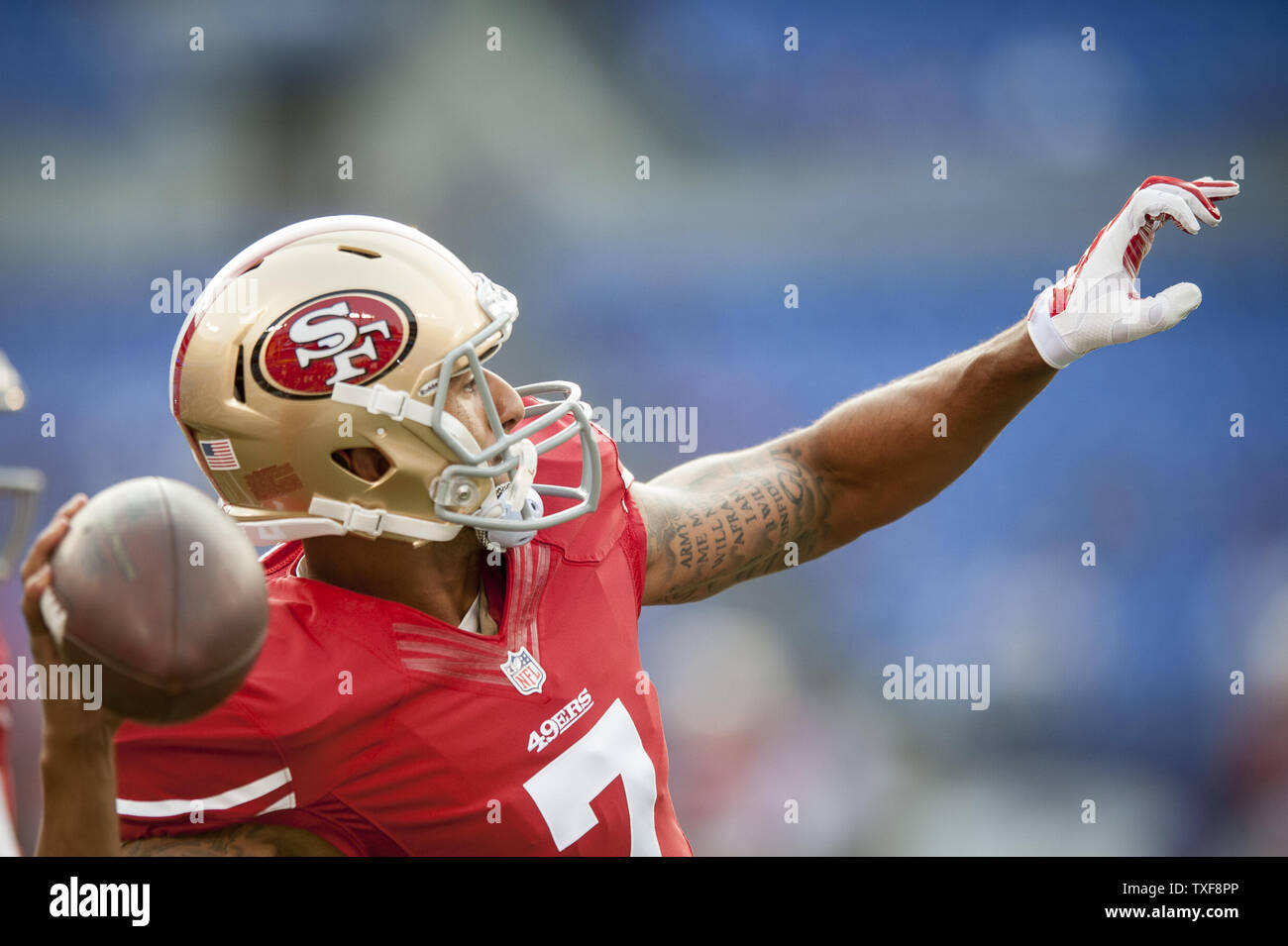 San Francisco 49ers quarterback Colin Kaepernick warms up before their first pre-season game against the Baltimore Ravens at M&T Bank Stadium on August 7, 2014 in Baltimore, Maryland. UPI/Pete Marovich Stock Photo