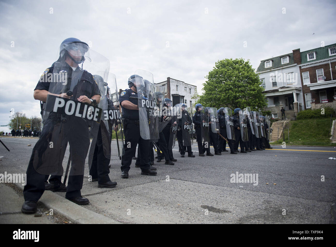 Police officers in riot gear block Reisterstown Road near Mondawmin ...