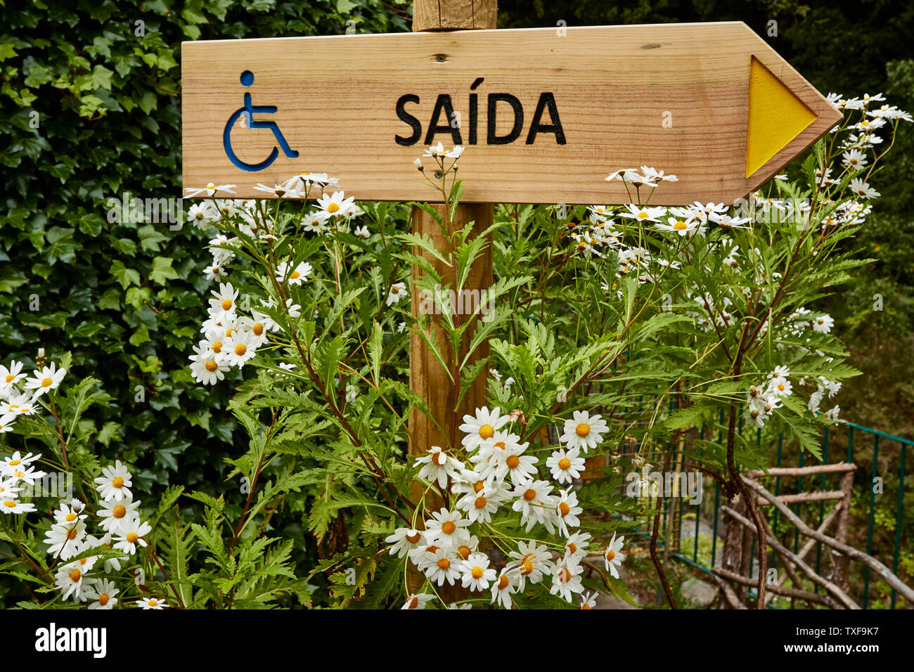 Wheelchair friendly way-out signage from the trout farm at Ribeiro Frio, Madeira, Portugal, European Union Stock Photo