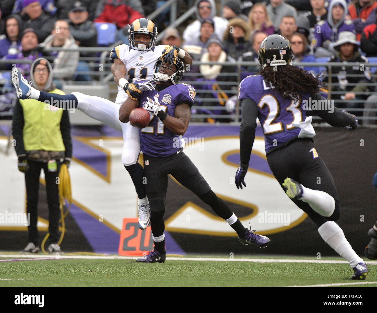 St. Louis Rams wide receiver Tavon Austin (11) can't bring in a catch as Baltimore Ravens cornerback Lardarius Webb (21) provides coverage in the first quarter at M&T Bank Stadium in Baltimore, Maryland on November 22, 2015. Photo by Kevin Dietsch/UPI Stock Photo