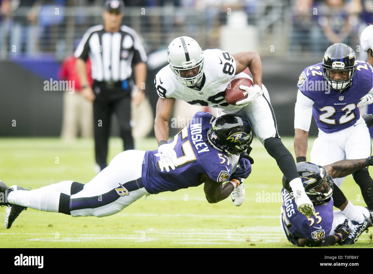 Oakland Raider wide receiver Amari Cooper tries to break through the