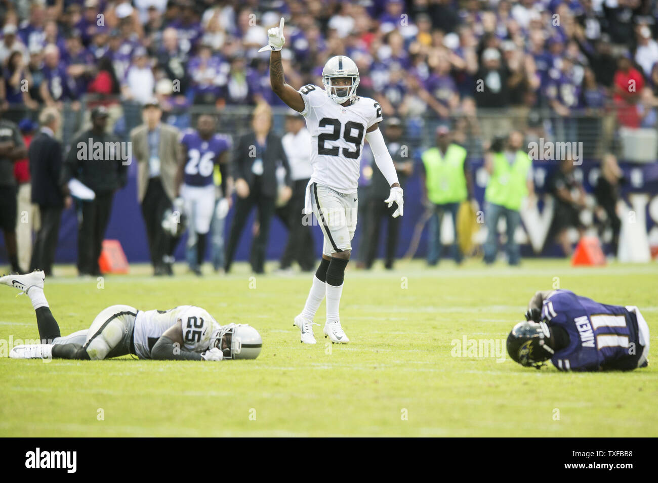 Oakland Raiders cornerback David Amerson starts to celebrate a win as the Raiders stop the Ravens with time running out in the fourth quarter at M&T Bank Stadium in Baltimore, Maryland on October 2, 2016. The Raiders won the game 28-27.      Photo by Pete Marovich/UPI Stock Photo