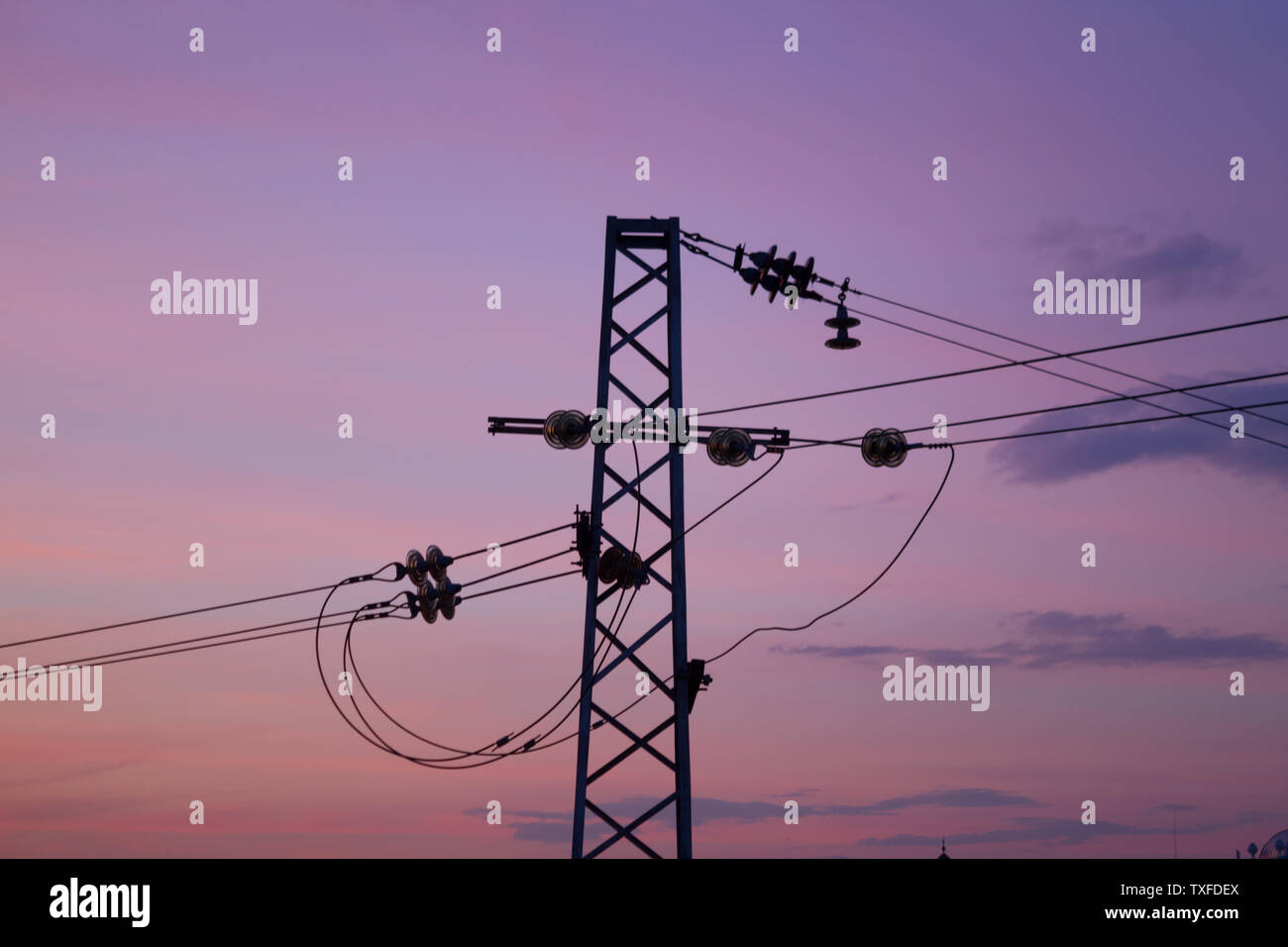 high voltage tower. sunset sky background Stock Photo - Alamy