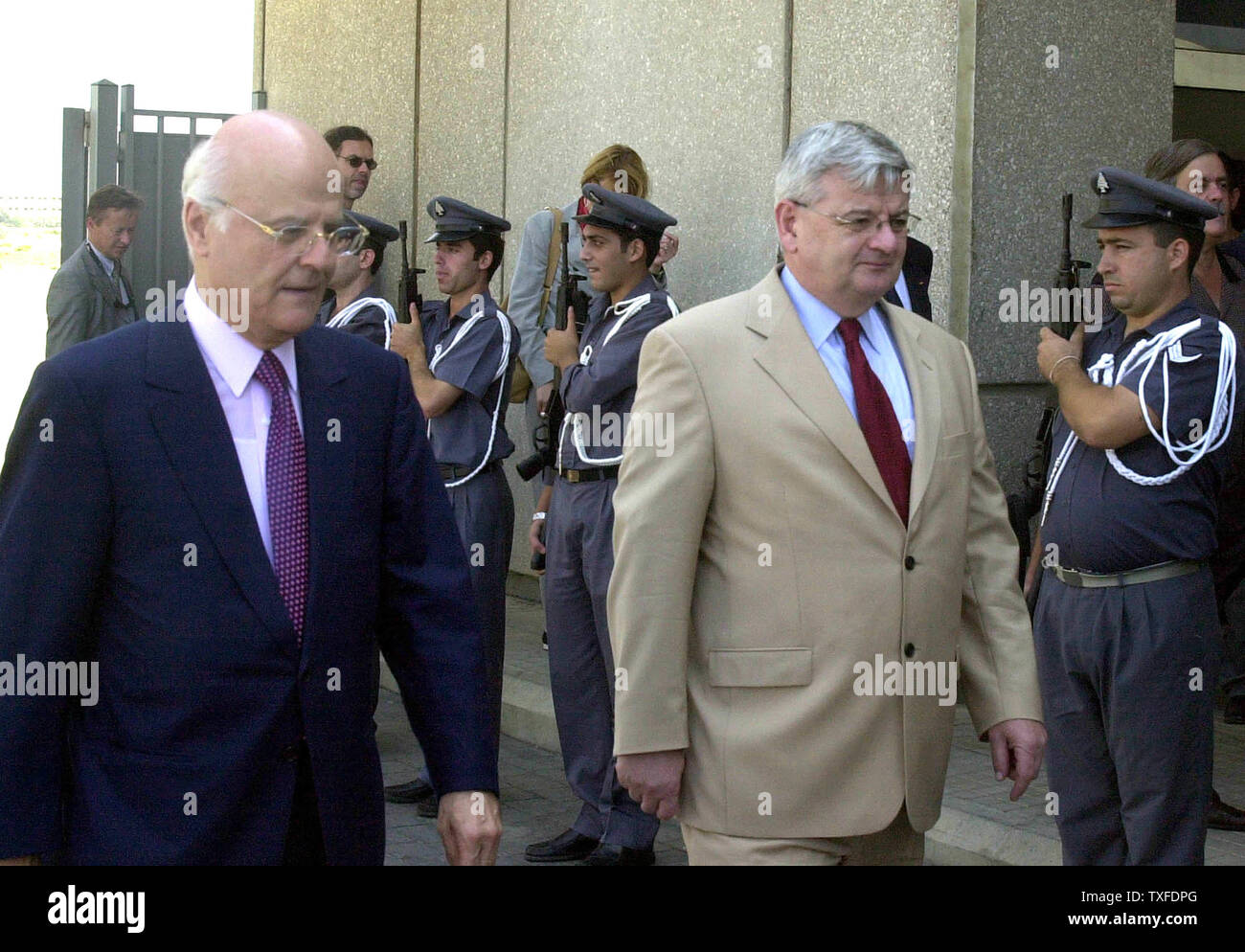 Lebanese Foreign Minister Jean Obeid (L) receives welcomes his German counterpart Joshka Fisher at Beirut airport on Friday, August 27. 2004. Fisher is visiting Lebanon as part of a Middle East tour.  (UPI Photo/Mohammed Tawil) Stock Photo