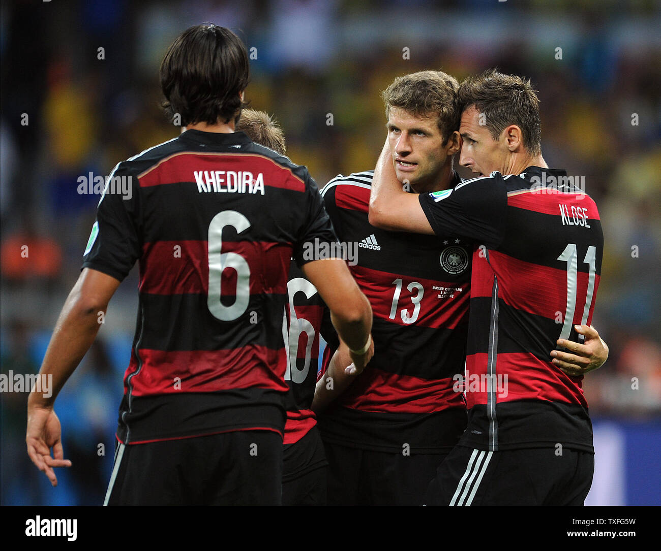 Miroslav Klose of Germany is congratulated by team-mate Thomas Muller (L) after scoring his side's second goal during the 2014 FIFA World Cup Semi Final match at the Estadio Mineirao in Belo Horizonte, Brazil on July 08, 2014. UPI/Chris Brunskill Stock Photo