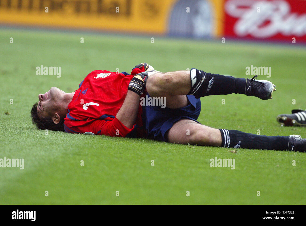 Argentina's goal keeper Roberto Abbondanzieri is hurt and in  pain during World Cup soccer at Olympiastadion on Friday, June 30, 2006 in Berlin, Germany. Germany defeated Argentina 4-2.   (UPI Photo/Arthur Thill) Stock Photo