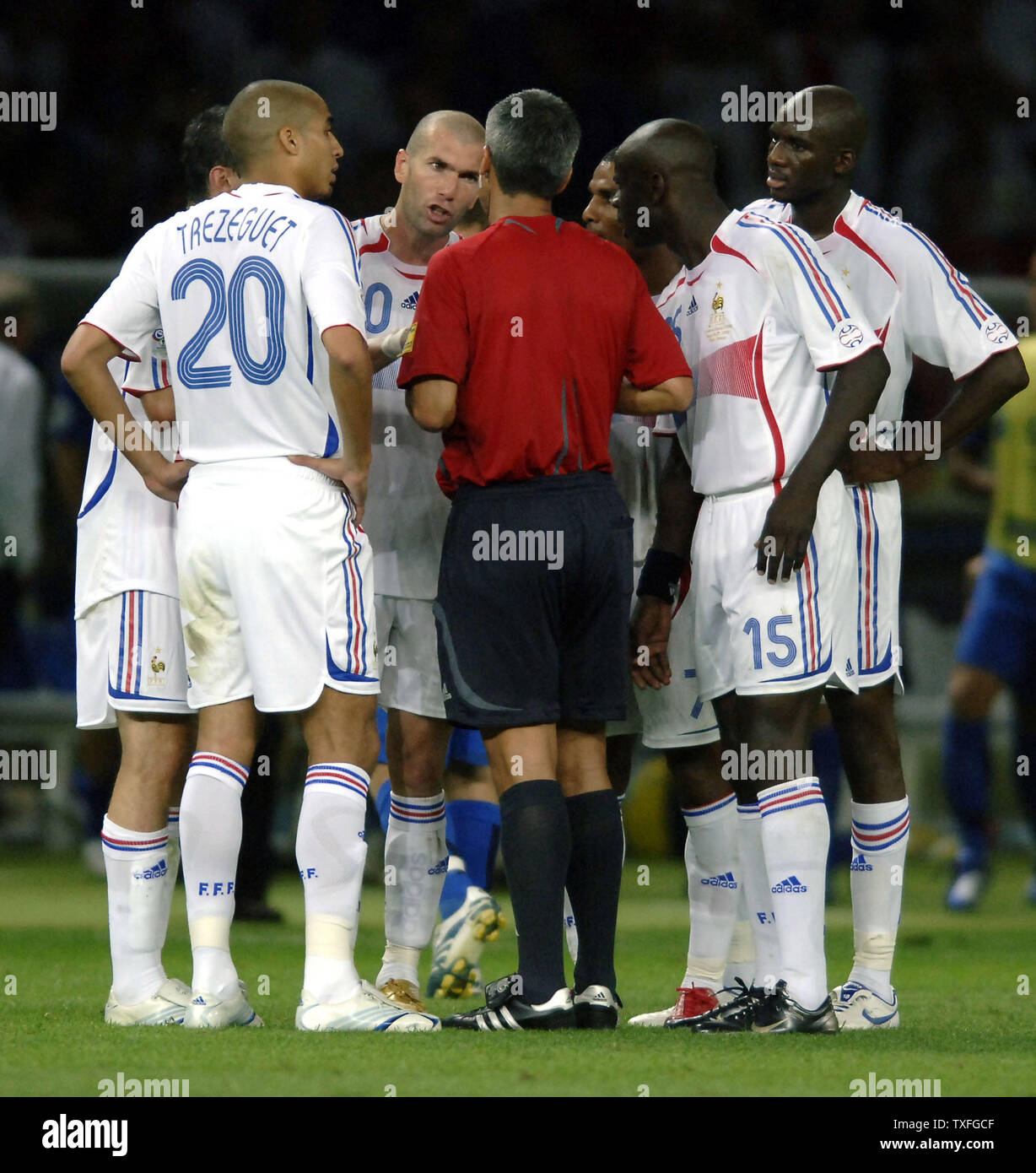 France S Zinedine Zidane Discusses His Red Card With The Referee After Being Exjected From The Match For Bad Behavior Against Italy S Marco Materazzi In The World Cup Soccer Final In Berlin Germany