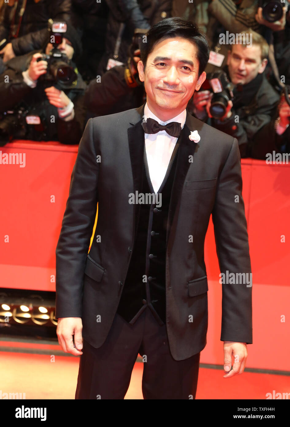 Tony Leung Chiu Wai arrives on the red carpet for the film 'The Grandmaster' during the opening of the 63rd Berlinale Film Festival in Berlin on February 7, 2013.   UPI/David Silpa Stock Photo