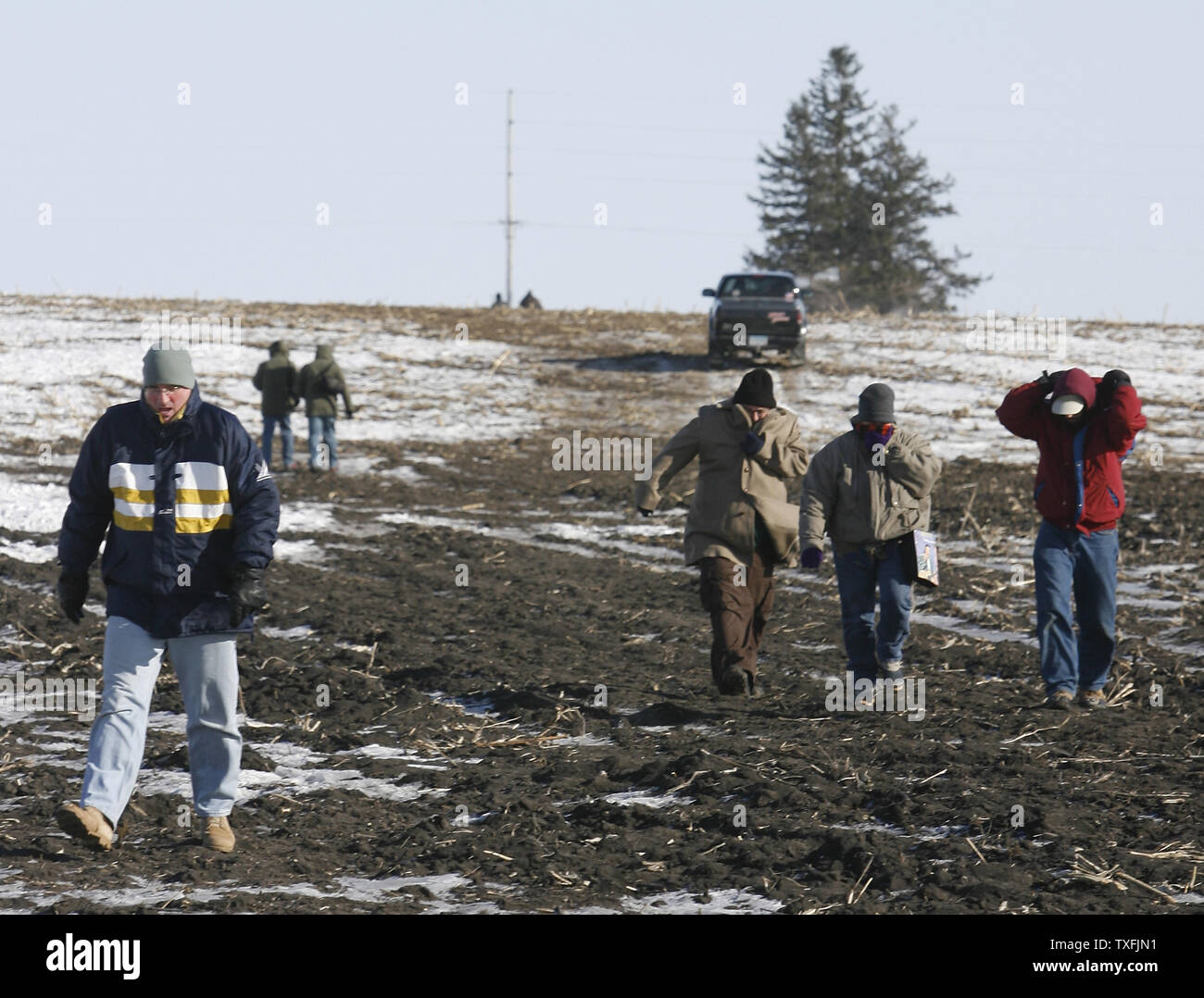 Rock 'n' roll fans brave the cold to visit the site of the plane crash that killed Buddy Holly, Ritchie Valens and J. P. 'The Big Bopper' Richardson near Clear Lake, Iowa on February 2, 2009. Singer Don McLean coined the phrase 'the day the music died' in his hit song American Pie referring to the death of the three rock 'n' roll pioneers in the early morning hours of February 3, 1959. Thousands of people descended upon Clear Lake to celebrate the 50th anniversary of 'the day the music died'.   (UPI Photo/Brian Kersey) Stock Photo