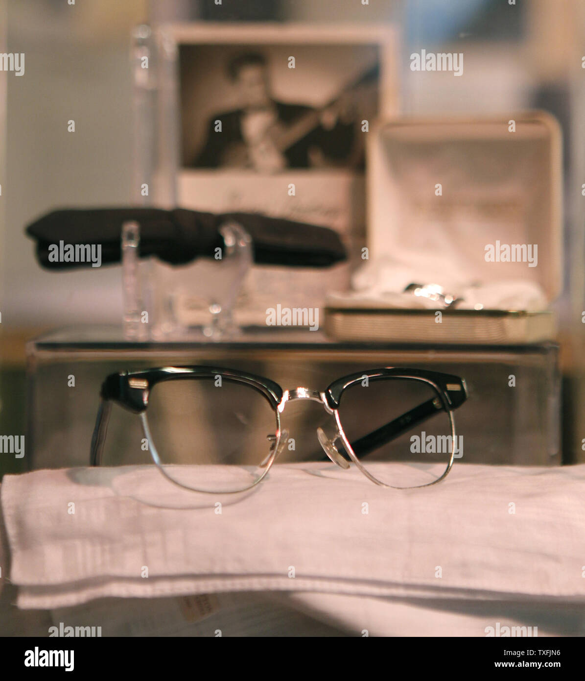 Eyeglasses belonging to Buddy Holly along with a bow tie and cufflinks belonging to Ritchie Valens are displayed before a tribute concert memorializing Holly, Valens, and J.P. 'The Big Bopper' Richardson at the Surf Ballroom in Clear Lake, Iowa on February 2, 2009. The three rock 'n' roll pioneers played their last show at the Surf Ballroom 50 years ago to the day. Singer Don McLean coined the phrase 'the day the music died' in his hit song 'American Pie' referring to the death of the plane crash that killed the three stars in the early morning hours of February 3, 1959.  (UPI Photo/Brian Kers Stock Photo