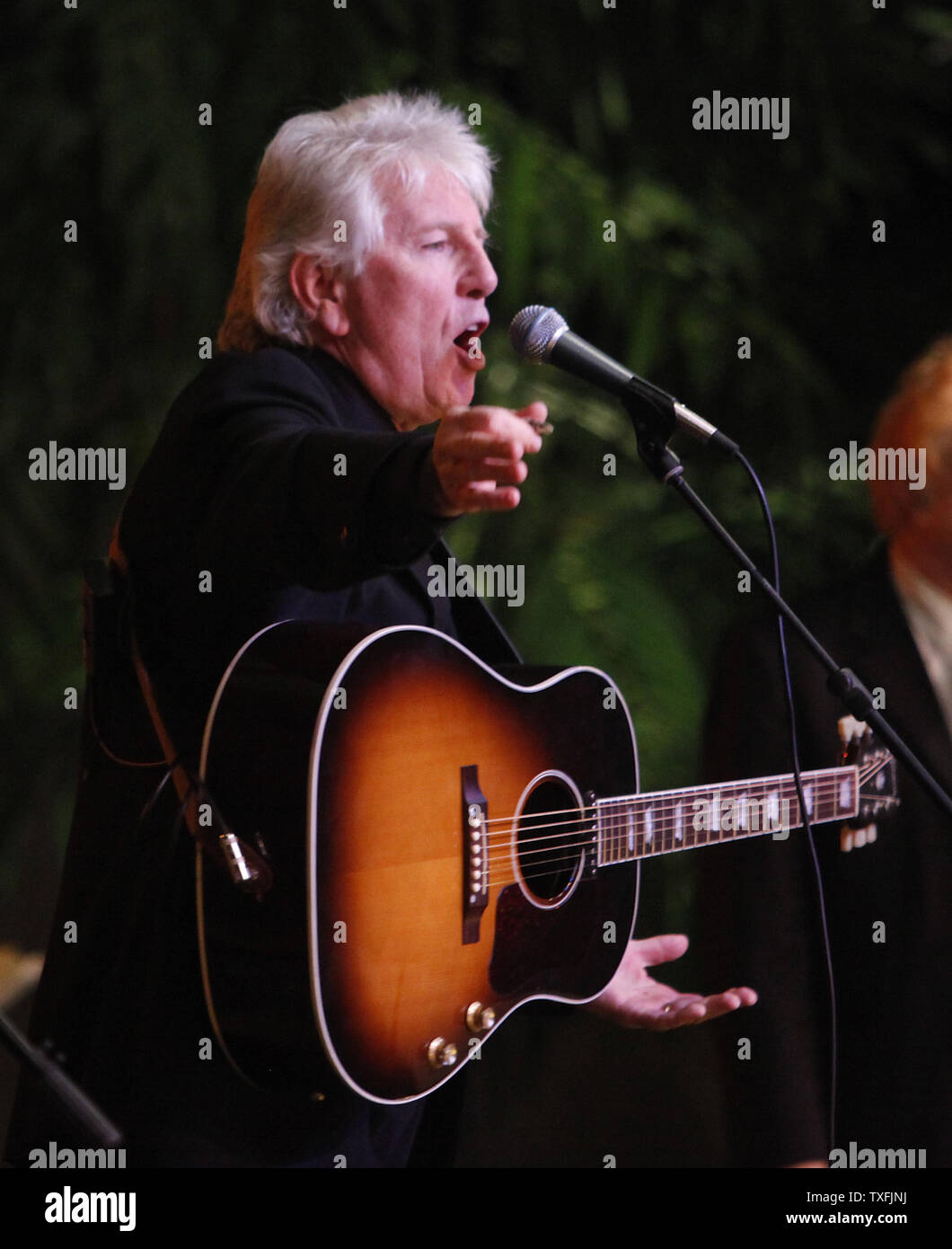 Graham Nash performs during a tribute concert memorializing Buddy Holly, J.P. 'The Big Booper' Richardson and Ritchie Valens at the Surf Ballroom in Clear Lake, Iowa on February 2, 2009. The three rock 'n' roll pioneers played their last show at the Surf Ballroom 50 years ago to the day. Singer Don McLean coined the phrase 'the day the music died' in his hit song American Pie referring to the death of the plane crash that killed the three stars in the early morning hours of February 3, 1959.  (UPI Photo/Brian Kersey) Stock Photo