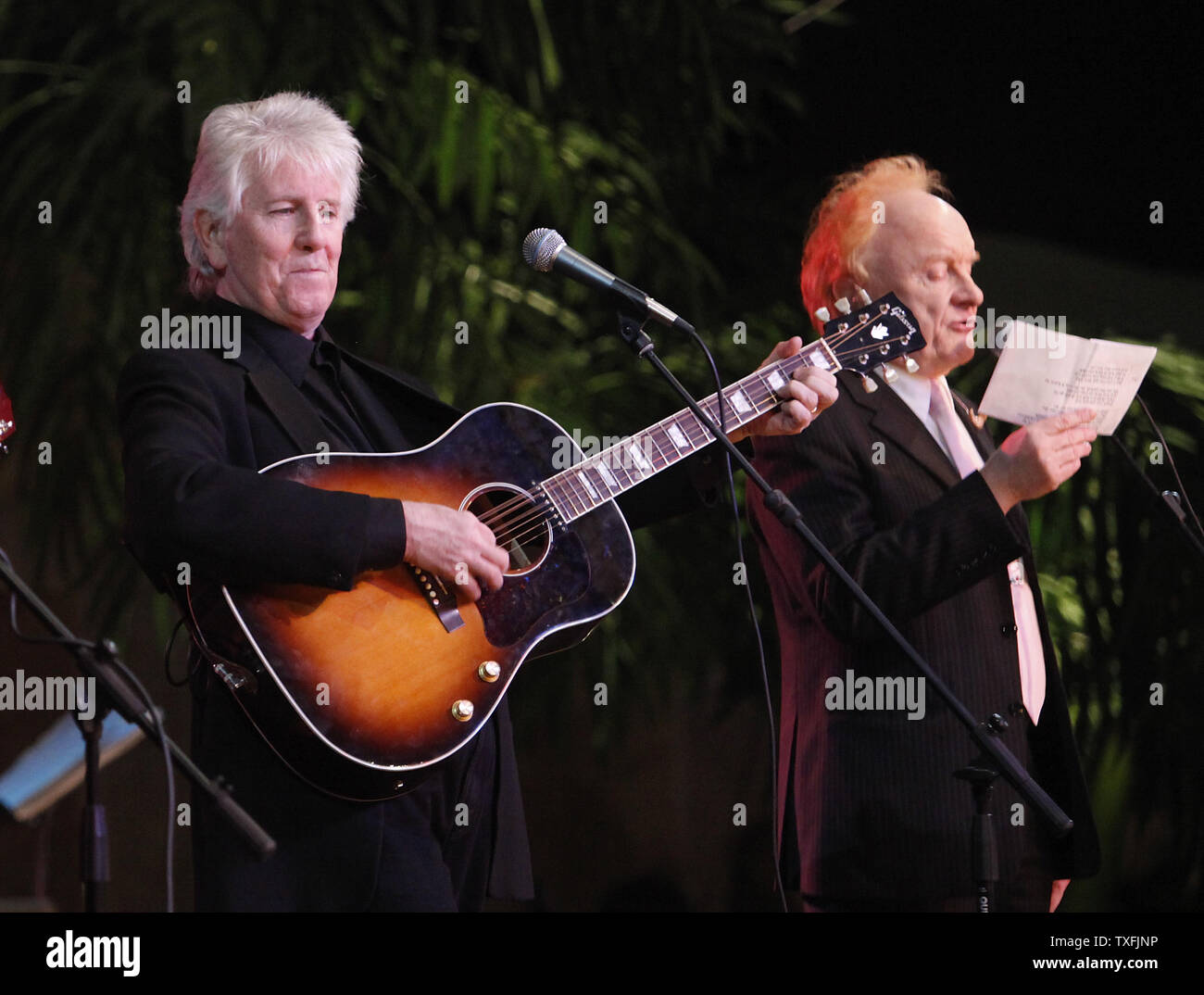 Graham Nash (L) performs with Peter Asher during a tribute concert memorializing Buddy Holly, J.P. 'The Big Booper' Richardson and Ritchie Valens at the Surf Ballroom in Clear Lake, Iowa on February 2, 2009. The three rock 'n' roll pioneers played their last show at the Surf Ballroom 50 years ago to the day. Singer Don McLean coined the phrase 'the day the music died' in his hit song American Pie referring to the death of the plane crash that killed the three stars in the early morning hours of February 3, 1959.  (UPI Photo/Brian Kersey) Stock Photo