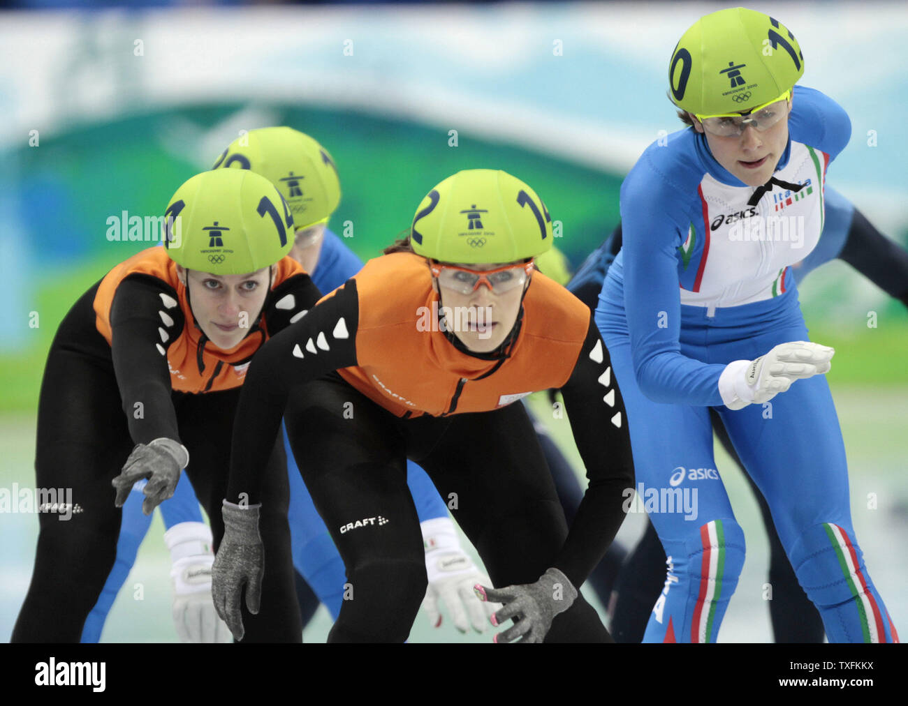 The Netherlands' Annita va Doorn (L) pushes teammate Liesbeth Mau Asam