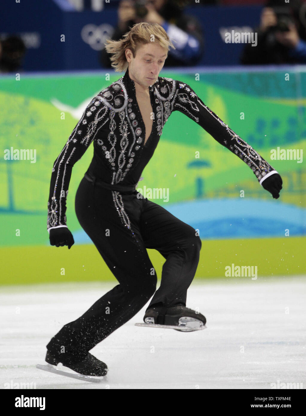 Evgeni Plushenko of Russia performs his short program in the men's