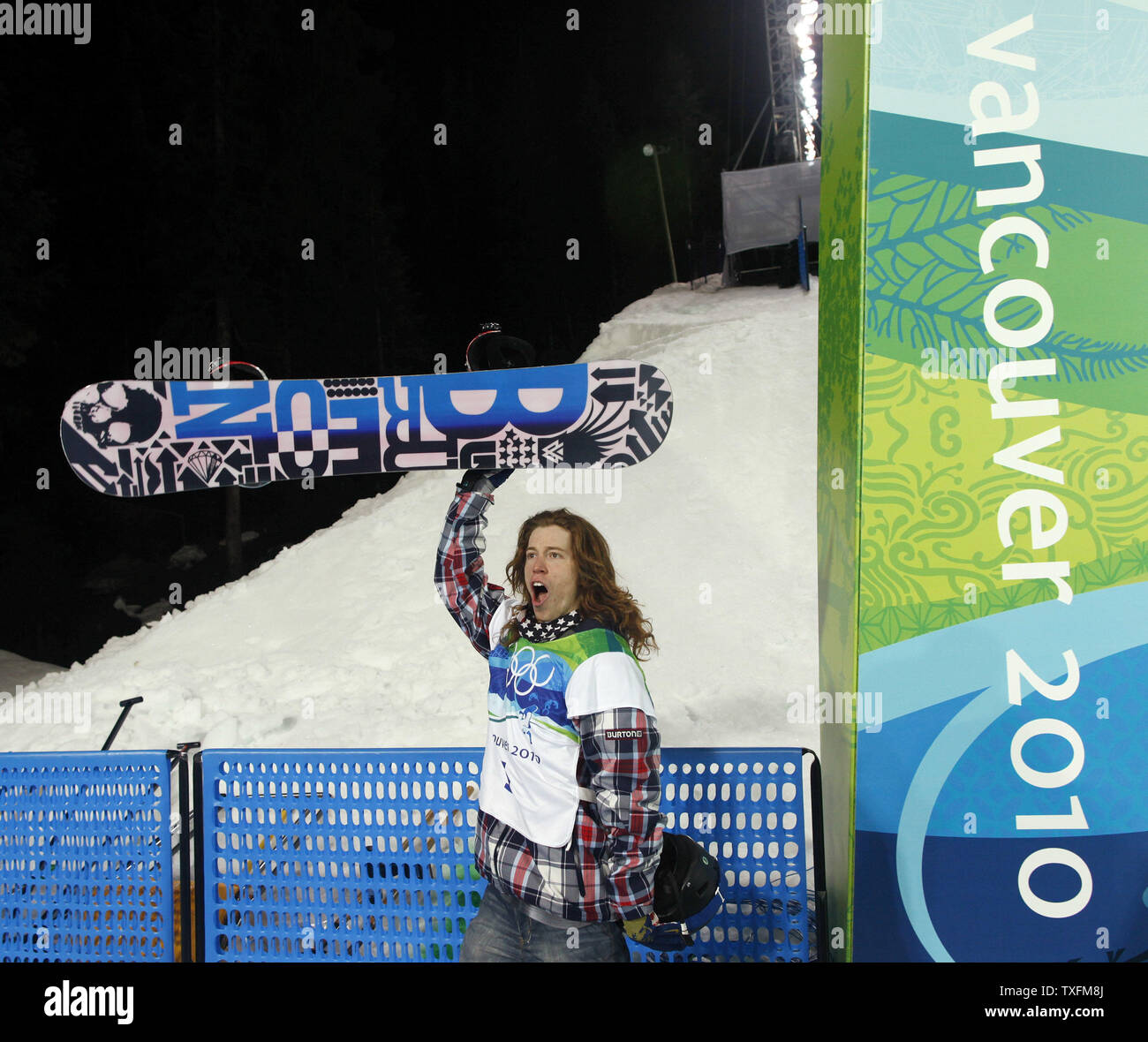 Shaun White of the United States reacts after his first run in the