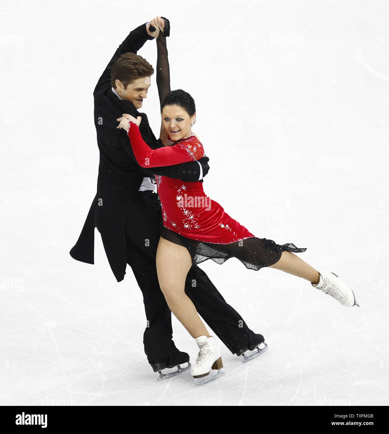 Alexandra Zaretsky (R) and Roman Zaretsky of Israel skate the