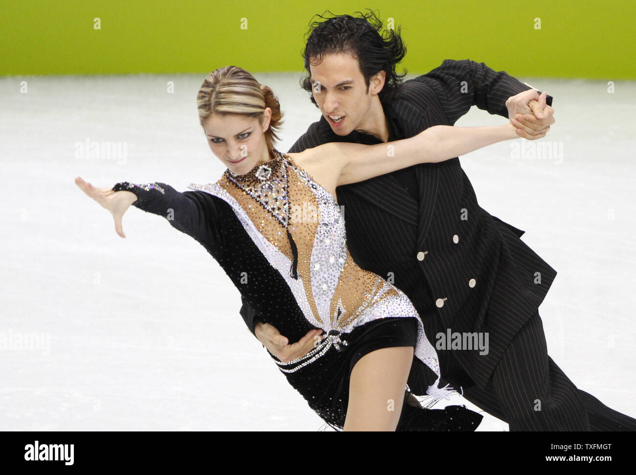 Tanith Belbin (L) and Benjamin Agosto of the United States skate the