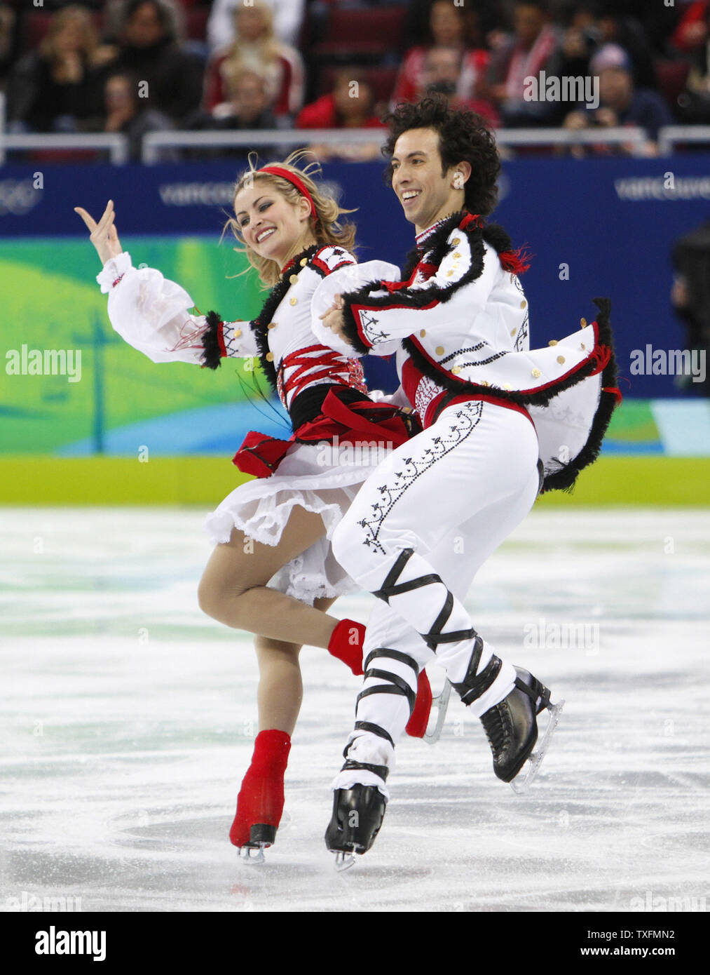 Tanith Belbin (L) and Benjamin Agosto of the United States skate during