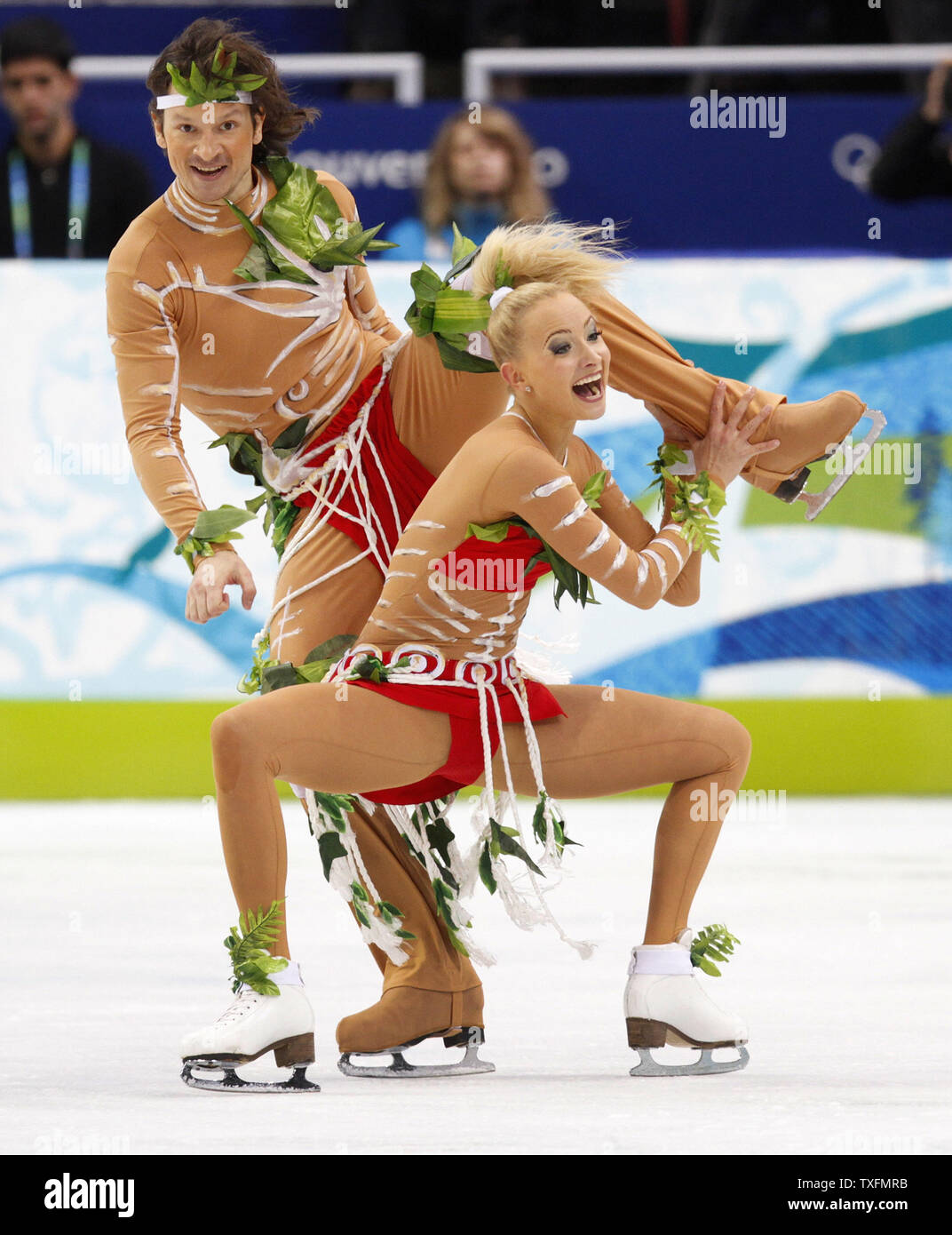 Oksana Domnina (R) and Maxim Shabalin of Russia skate during their