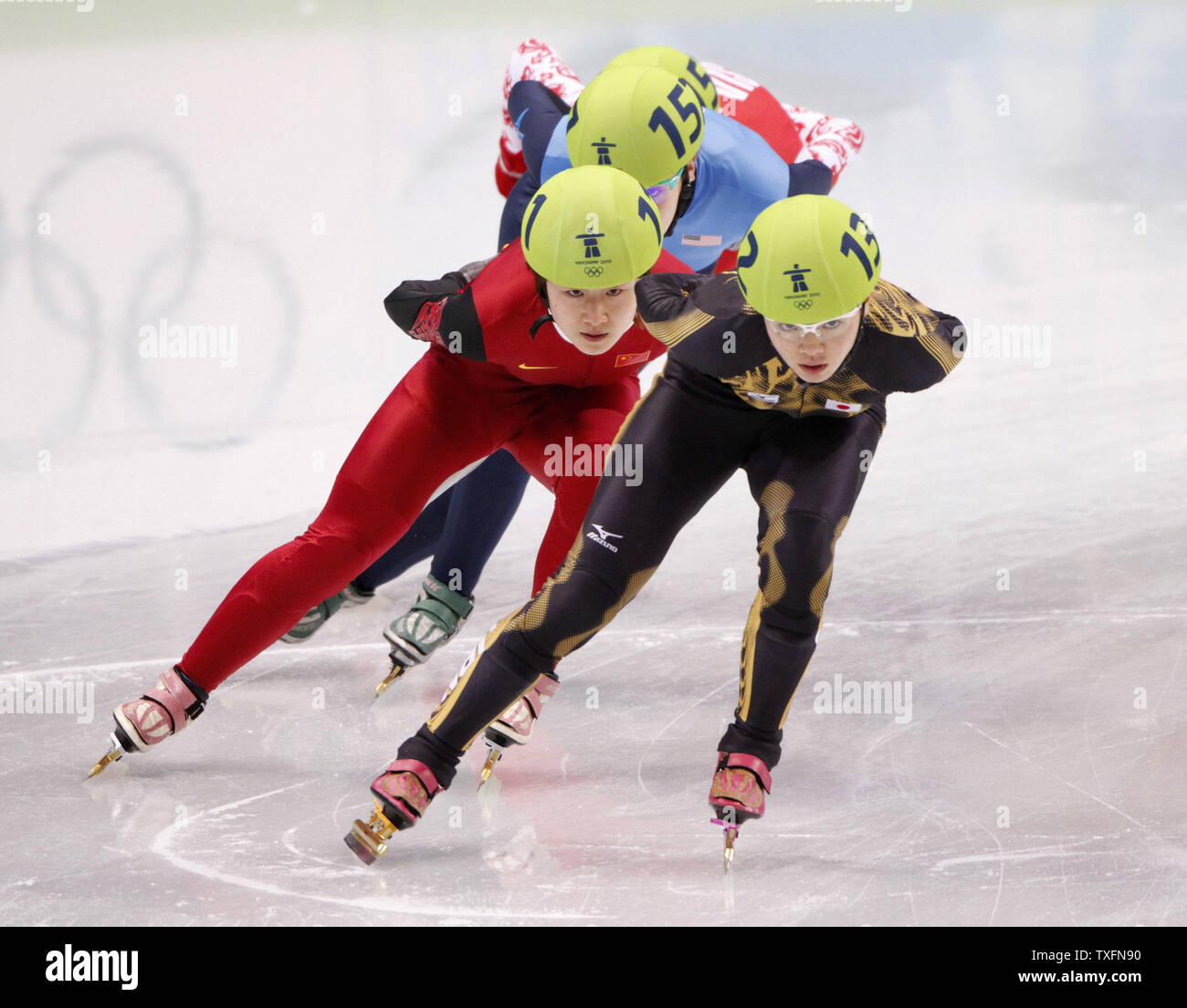 Ayuko Ito Of Japan R And Linlin Sun Of China Skate In The Women s 