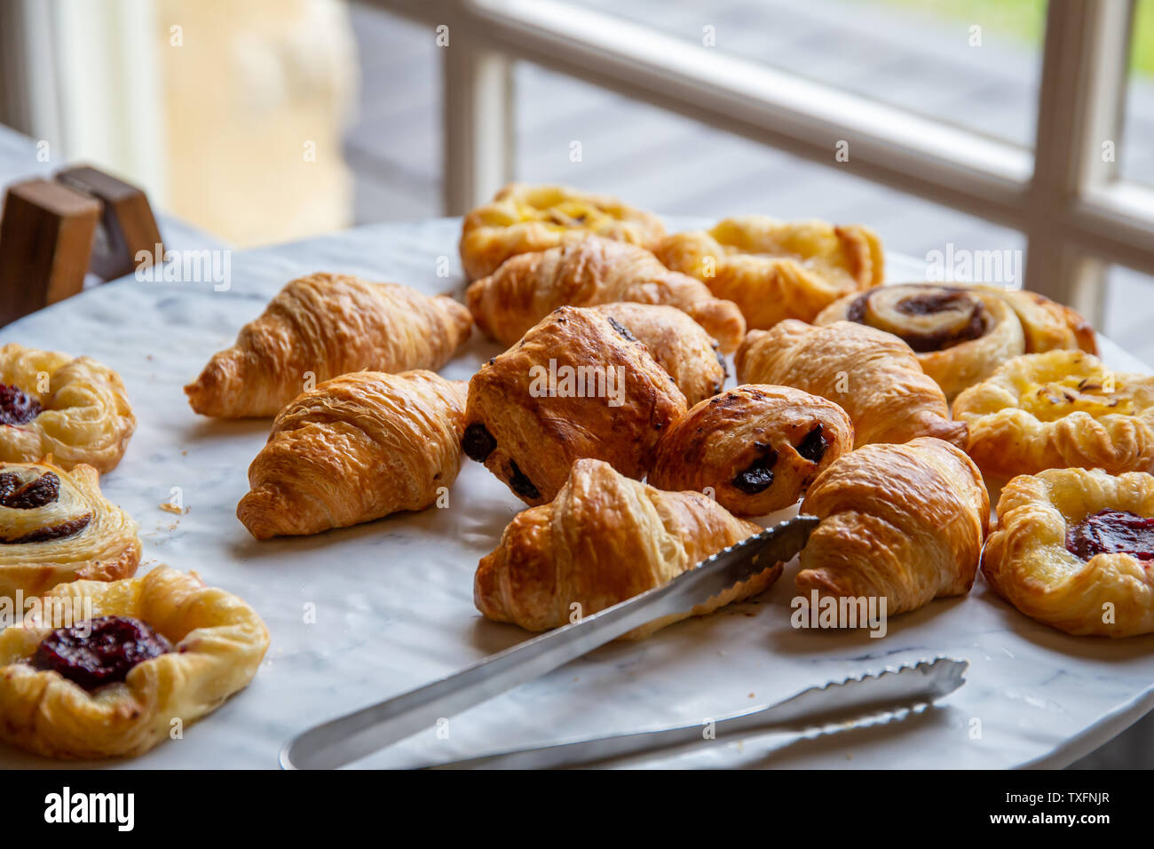 Assortment of french baked breakfast pastries as part of a hotel