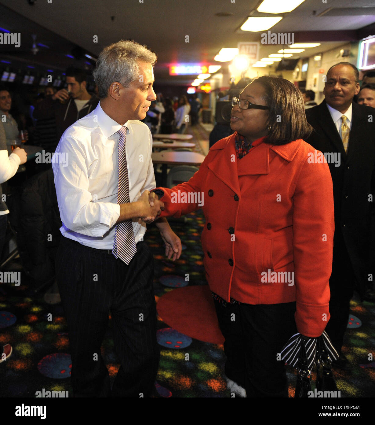 Chicago mayoral candidate Rahm Emanuel greets patrons at a bowling alley in Chicago on January 24, 2011. An Illinois appellate court threw the former congressman and White House chief of staff off the ballot ruling that he did not meet the residency requirements to run for mayor of Chicago.      UPI/Brian Kersey Stock Photo