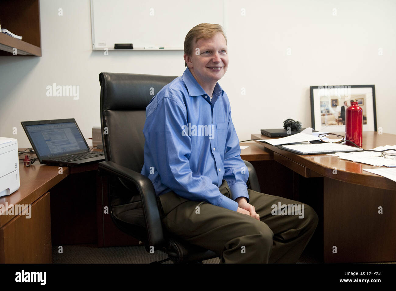 Obama 2012 Campaign Manager Jim Messina Sits At As Desk As He