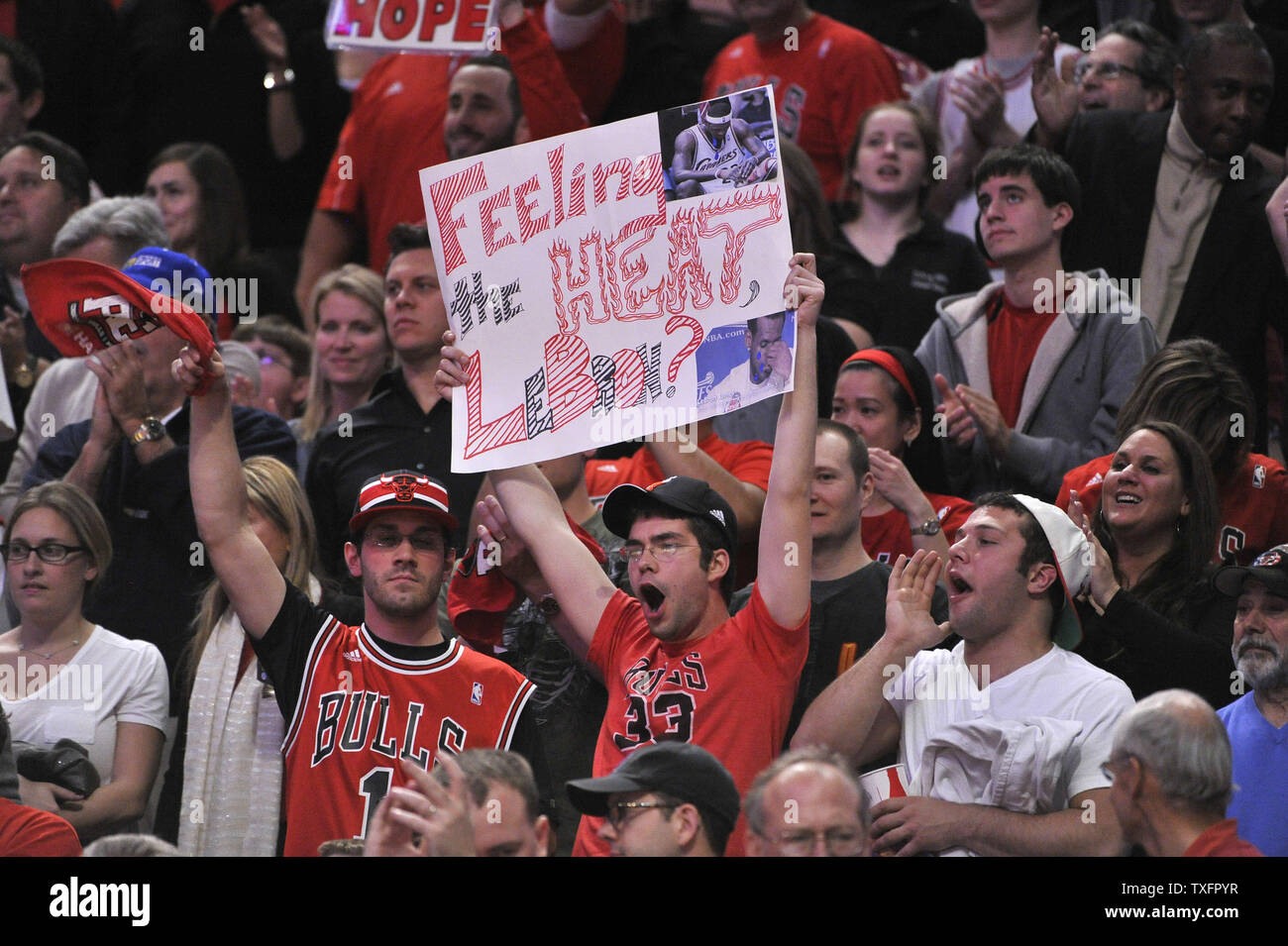 Chicago Bulls fans cheer during the fourth quarter of game 1 of the Eastern  Conference Finals against the Heat at the United Center in Chicago on May  15, 2011. The Bulls won