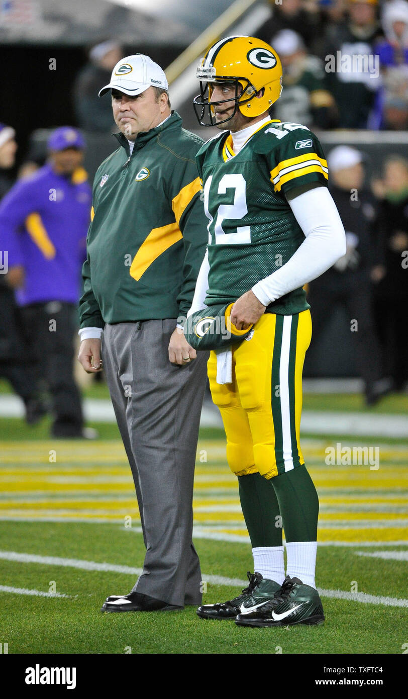 Green Bay Packers head coach Mike McCarthy (L) and quarterback Aaron ...