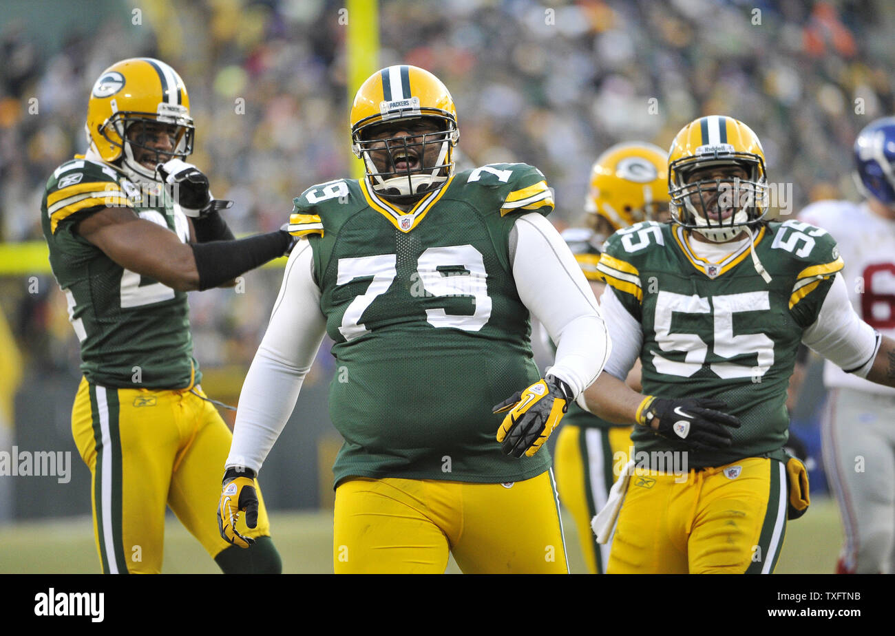 Green Bay Packers defensive back Jarrett Bush (L-R), defensive end