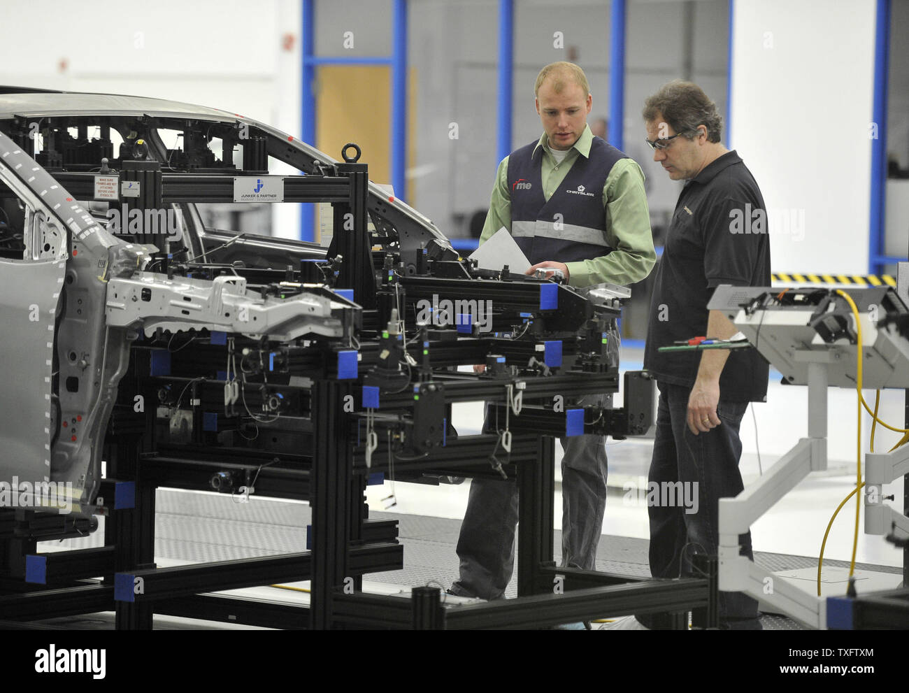 Workers in the Metrology Lab at Chrysler's Belvidere Assembly Plant