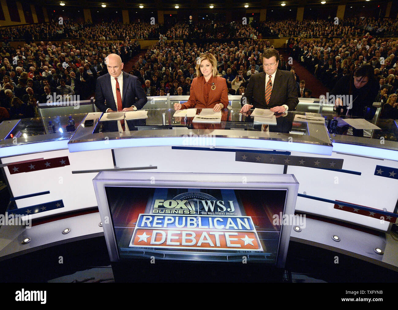 Debate moderators Gerard Baker (L-R), Maria Bartiromo and Neil Cavuto get ready for the fourth Republican debate at the Milwaukee Theater in Milwaukee, Wisconsin on November 10, 2015. Twelve candidates are debating each other in two difference segments.     Photo by Brian Kersey/UPI Stock Photo
