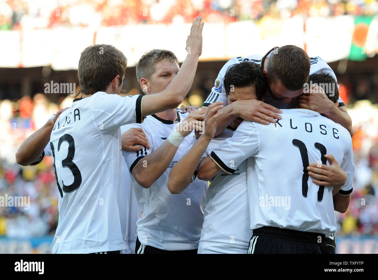 Miroslav Klose of Germany is congratulated by his team-mates after scoring the opening goal during the Round of 16 match at the Free State Stadium in Bloemfontein, South Africa on June 27, 2010. UPI/Chris Brunskill Stock Photo
