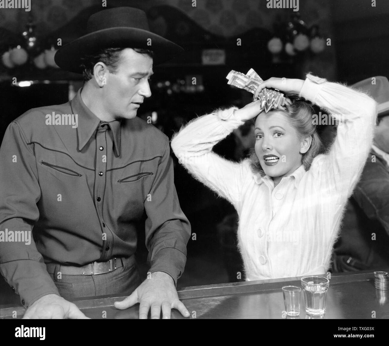 A Lady Takes a Chance Year : 1943 USA Director : William A. Seiter John  Wayne, Jean Arthur Stock Photo - Alamy