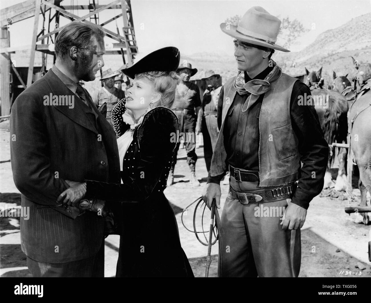 In Old Oklahoma Year : 1943 USA Director : Albert Rogell Albert Dekker, John Wayne, Martha Scott Stock Photo