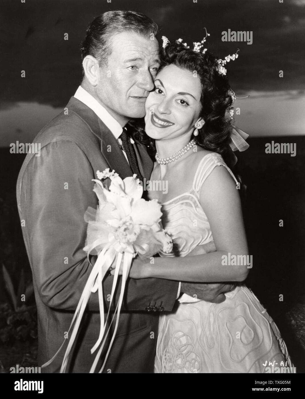 John Wayne with his third wife Pilar Palette Wedding date 31 mars 1956 Stock Photo