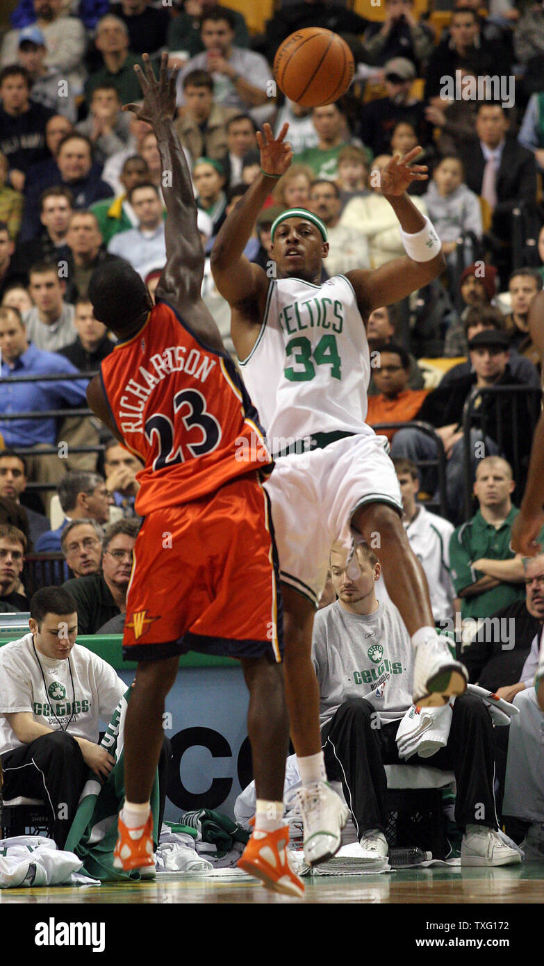Boston Celtics Captain Paul Pierce Makes A Pass Against Golden State Warriors Guard Jason Richardson At The Td Banknorth Garden In Boston On December 19 2005 The Celtics Defeated The Warriors 109 98
