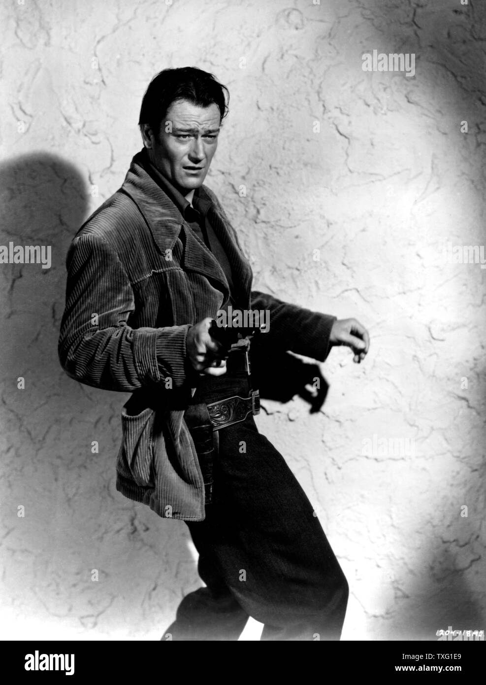 The Spoilers Year: 1942 USA Director: Ray Enright John Wayne Stock ...