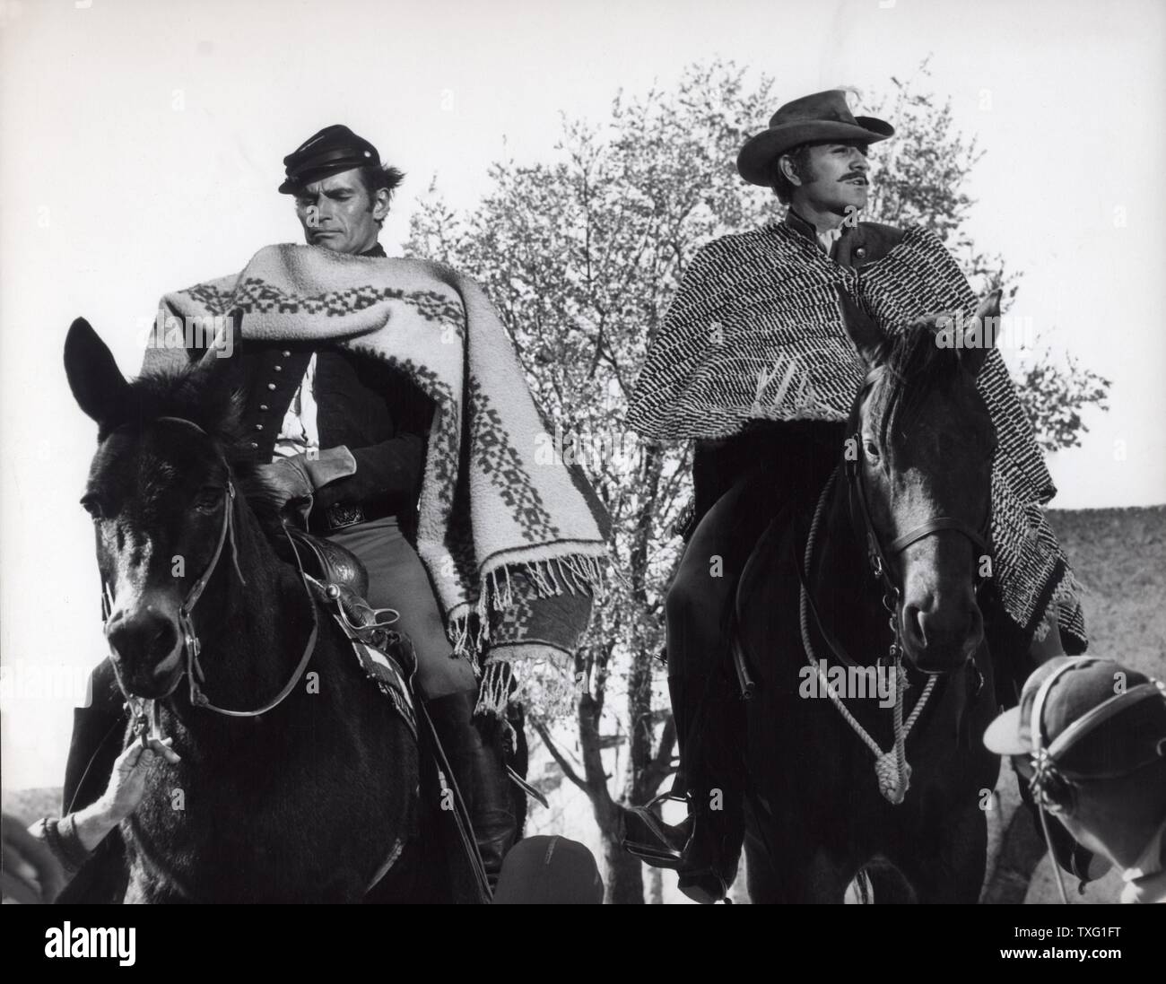 Major Dundee  Year: 1965  USA Director: Sam Peckinpah Charlton Heston, Richard Harris On the set Stock Photo
